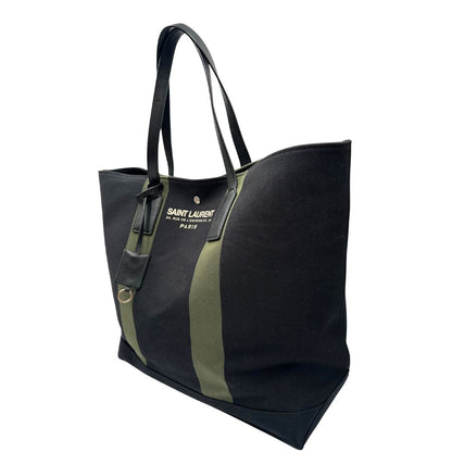 lato Borsa Saint Laurent in tessuto nero con bande verdi e finiture in pelle; munita di doppi manici e un accessorio portachiavi. Completa di dustbag, di lusso, originale, ottime condizioni. 