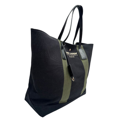lato Borsa Saint Laurent in tessuto nero con bande verdi e finiture in pelle; munita di doppi manici e un accessorio portachiavi. Completa di dustbag, di lusso, originale, ottime condizioni. 