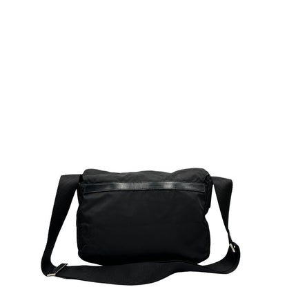 retro Borsa Prada in nylon nero con finiture in pelle tono su tono e parti metalliche argentate; munita di una tracolla regolabile in tessuto, di lusso, originale, ottime condizioni, usata. 