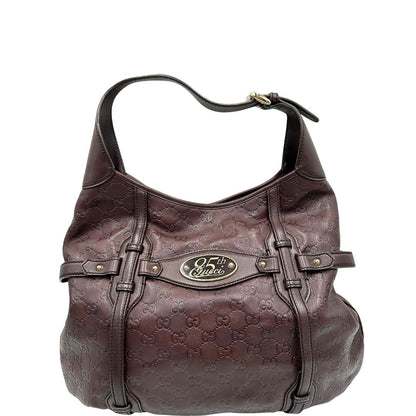 retro Borsa Gucci in pelle GG color vinaccia con parti metalliche dorate; munita di un manico singolo e impreziosita da dettaglio Horsebit sul front. Completa di dustbag, di lusso, originale, ottime condizioni.