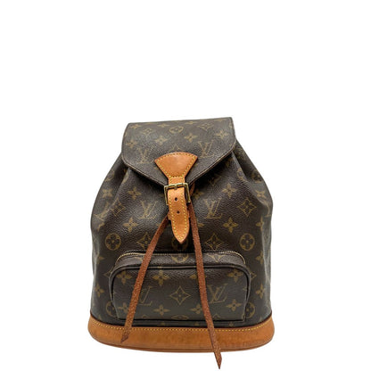 front Zaino Montsouris mini in canvas marrone monogram con finiture in vacchetta naturale e parti metalliche dorate, munito di un anello sulla parte superiore e due bretelle in vacchetta regolabili con fibbie, di lusso, originale, ottime condizioni. 