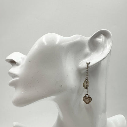 Orecchini Tiffany&Co. della collezione Return To Tiffany con pendenti a forma di cuore in argento 925. Completi di sacchetto, di lusso, originale, ottime condizioni, usata.