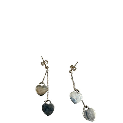 Orecchini Tiffany&Co. della collezione Return To Tiffany con pendenti a forma di cuore in argento 925. Completi di sacchetto, di lusso, originale, ottime condizioni, usata.