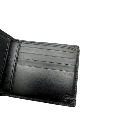 Interno di un Portafoglio Gucci pelle nera GG impreziosito da striscia Web verde e rossa. Completo di scatola e dustbag. Originale, usata, di lusso, in ottime condizioni.