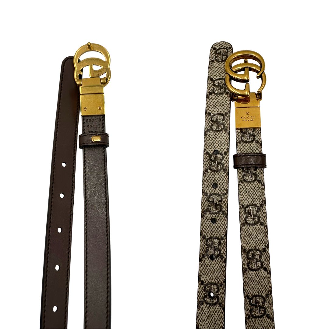 Cintura Gucci reversibile in canvas beige GG e marrone con parti metalliche dorate, di lusso, ottime condizioni, usata.