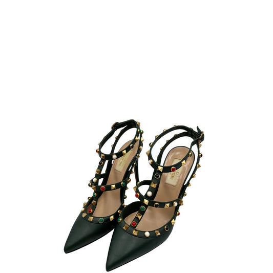 Scarpe VG in pelle verde scuro impreziosita da borchie colorate lungo le finiture. Complete di corredo, di lusso, originale, ottime condizioni.