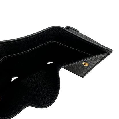 interno Portafoglio Prada in pelle martellata nera con parti metalliche dorate. Completa di scatola, di lusso, ottime , usata. 