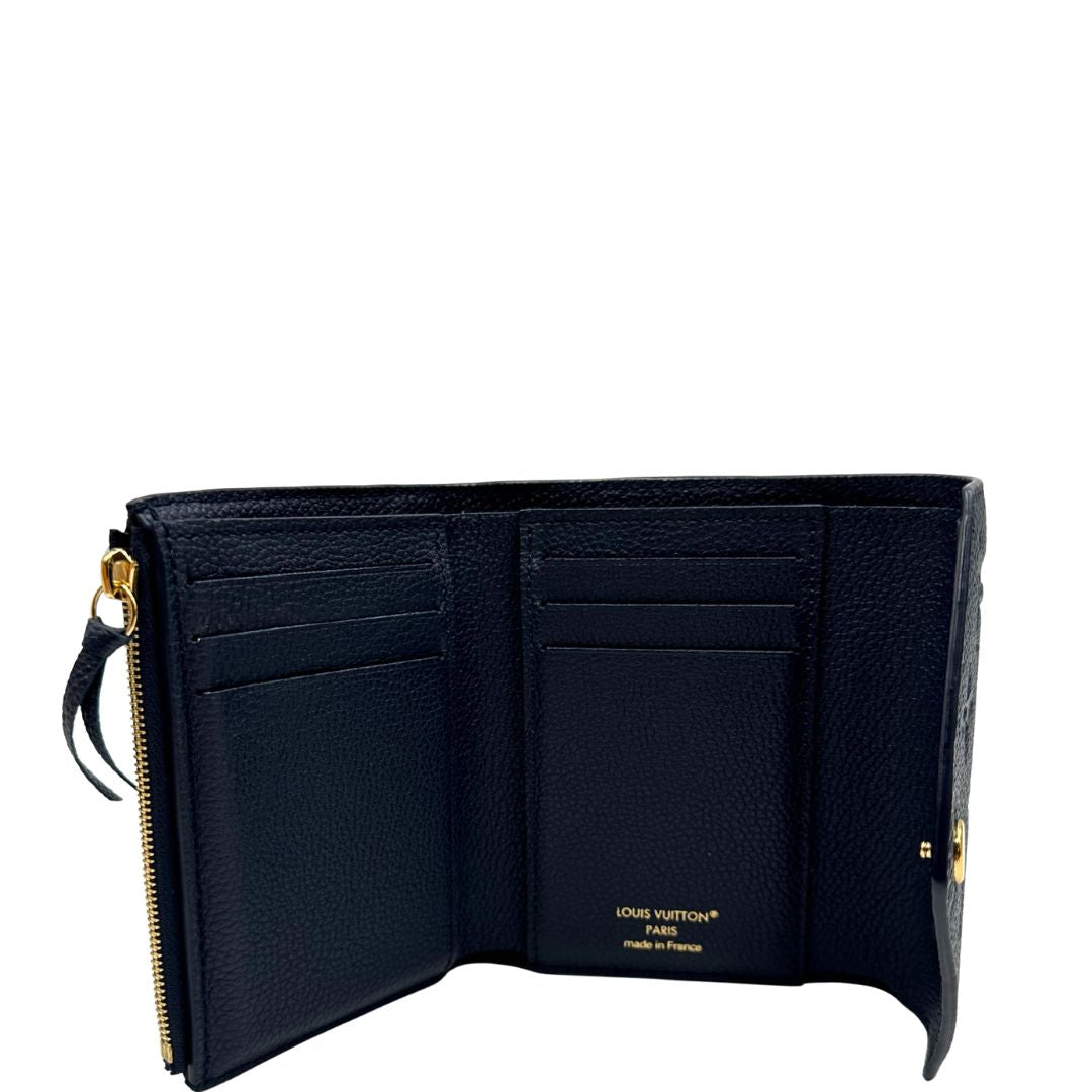 interno Portafoglio Louis Vuitton in pelle blu monogram Empreinte con parti metalliche dorate. Completo di scatola, di lusso, originale, ottime condizioni. 