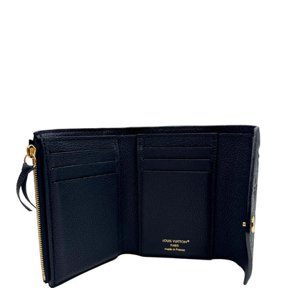 interno Portafoglio Louis Vuitton in pelle blu monogram Empreinte con parti metalliche dorate. Completo di scatola, di lusso, originale, ottime condizioni. 