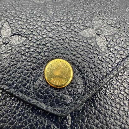 chiusura Portafoglio Louis Vuitton in pelle blu monogram Empreinte con parti metalliche dorate. Completo di scatola, di lusso, originale, ottime condizioni.