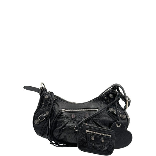 front Borsa Balenciaga in pelle nera con parti metalliche argentate; munita di una tracolla regolabile e impreziosita da iconiche borchie, di lusso, originale, ottime condizioni. 