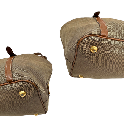 angoli  Borsa Prada in tessuto Jacquard, finiture in pelle marroni e parti metalliche dorate; munita di doppi manici e una tracolla amovibile e regolabile. Completa di dustbag, di lusso, originale, ottime condizioni. 
