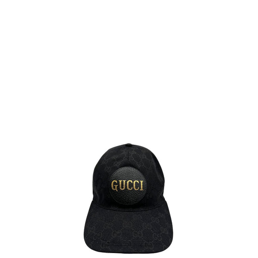 front Cappello Gucci in tessuto GG nero con logo frontale dorato. Munito di dustbag e cartellino, di lusso, originale, ottime condizioni. 