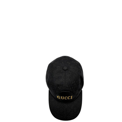 Cappello Gucci in tessuto GG nero con logo frontale dorato. Munito di dustbag e cartellino, di lusso, originale, ottime condizioni.