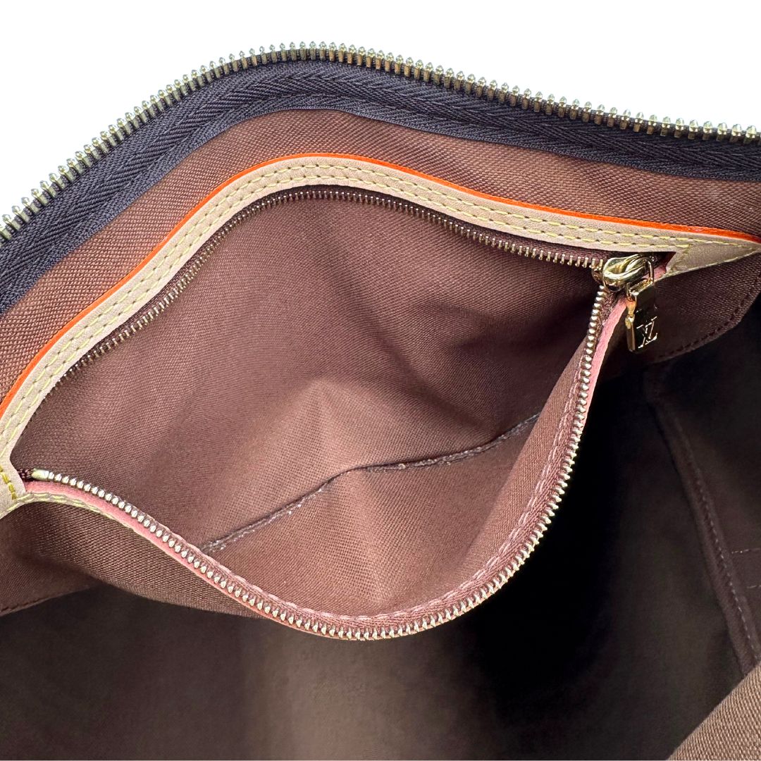 interno Borsa Speedy 35 in canvas marrone monogram con finiture in vacchetta naturale e parti metalliche dorate; munita di doppi manici stondati e una tracolla amovibile e regolabile. Completa di corredo, lucchetto e chiavi, di lusso, originale, eccellenti condizioni. 