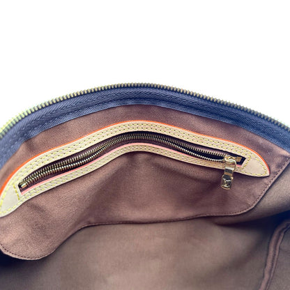 interno Borsa Speedy 35 in canvas marrone monogram con finiture in vacchetta naturale e parti metalliche dorate; munita di doppi manici stondati e una tracolla amovibile e regolabile. Completa di corredo, lucchetto e chiavi, di lusso, originale, eccellenti condizioni. 