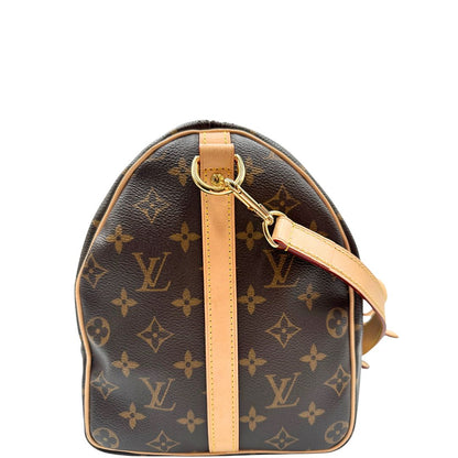 lato Borsa Speedy 35 in canvas marrone monogram con finiture in vacchetta naturale e parti metalliche dorate; munita di doppi manici stondati e una tracolla amovibile e regolabile. Completa di corredo, lucchetto e chiavi, di lusso, originale, eccellenti condizioni. 