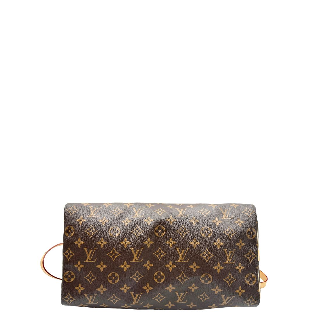 base Borsa Speedy 35 in canvas marrone monogram con finiture in vacchetta naturale e parti metalliche dorate; munita di doppi manici stondati e una tracolla amovibile e regolabile. Completa di corredo, lucchetto e chiavi, di lusso, originale, eccellenti condizioni. 