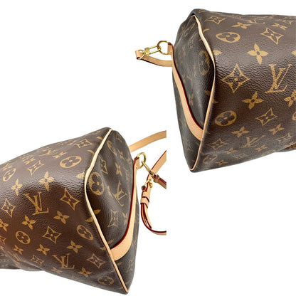 angoli Borsa Speedy 35 in canvas marrone monogram con finiture in vacchetta naturale e parti metalliche dorate; munita di doppi manici stondati e una tracolla amovibile e regolabile. Completa di corredo, lucchetto e chiavi, di lusso, originale, eccellenti condizioni. 