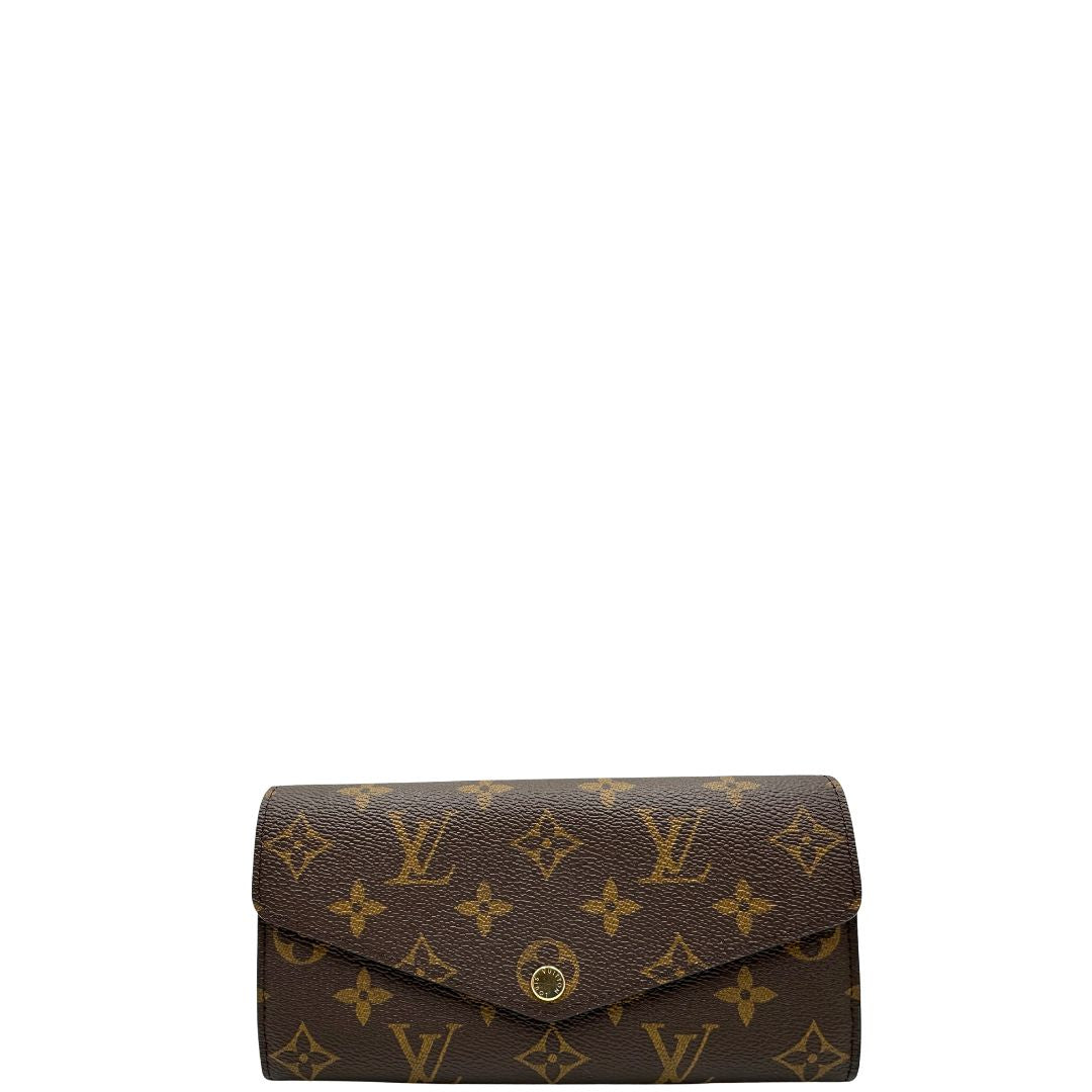 front Portafoglio Louis Vuitton in canvas marrone monogram con parti metalliche dorate. Full set, di lusso, originale, eccellenti condizioni. 