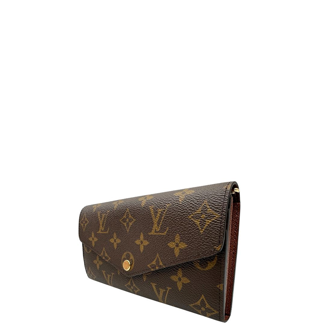 lato Portafoglio Louis Vuitton in canvas marrone monogram con parti metalliche dorate. Full set, di lusso, originale, eccellenti condizioni. 