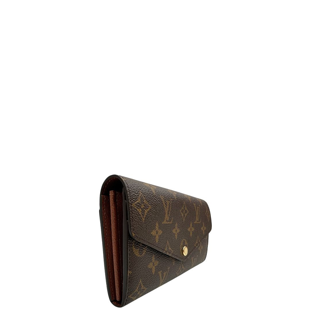 lato Portafoglio Louis Vuitton in canvas marrone monogram con parti metalliche dorate. Full set, di lusso, originale, eccellenti condizioni. 