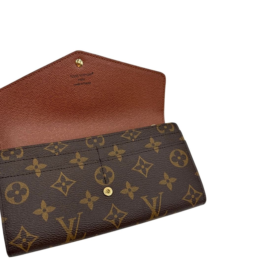 interno Portafoglio Louis Vuitton in canvas marrone monogram con parti metalliche dorate. Full set, di lusso, originale, eccellenti condizioni. 