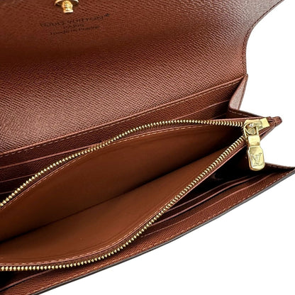 interno Portafoglio Louis Vuitton in canvas marrone monogram con parti metalliche dorate. Full set, di lusso, originale, eccellenti condizioni. 