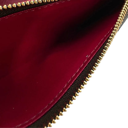 interno Portafoglio Louis Vuitton in canvas marrone monogram con parti metalliche dorate. Completo di corredo, di lusso, originale, eccellenti condizioni. 