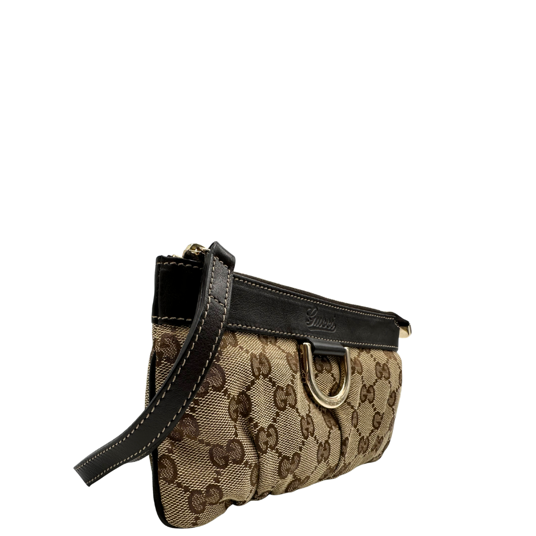 lato Pochette Gucci in tessuto Gucci in tessuto GG beige con finiture in pelle marroni e parti metalliche dorate; munita di un polsino, da portare a mano. Completa di corredo, di lusso, originale, ottime condizioni. 