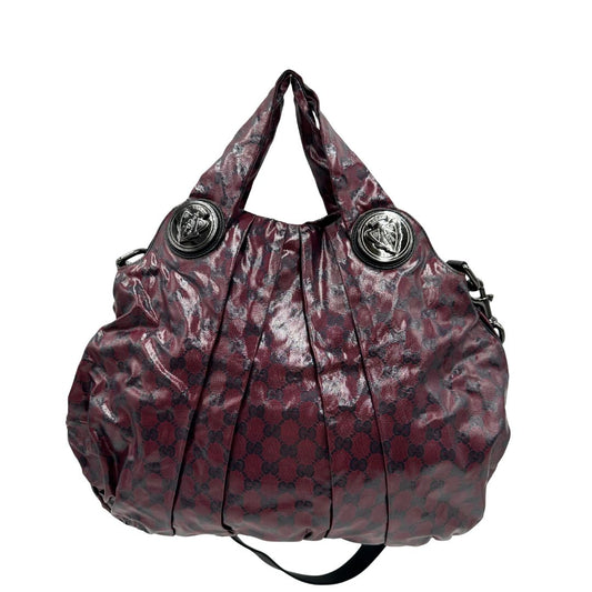front Borsa Gucci in canvas bordeaux GG con parti metalliche in argento brunito e finiture nere; munita di doppi manici e una tracolla amovibile, di lusso, originale, ottime condizioni. 