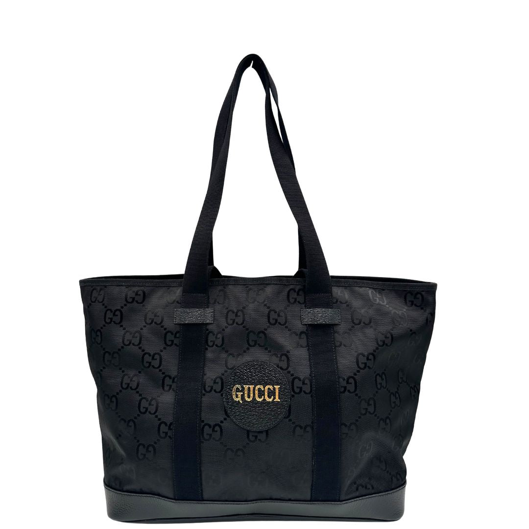 front Borsa Gucci in nylon GG nero con finiture in pelle tono su tono e parti metalliche argentate; munita di doppi manici in tessuto, indossabile a spalla, di lusso, originale, ottime condizioni8, usata 