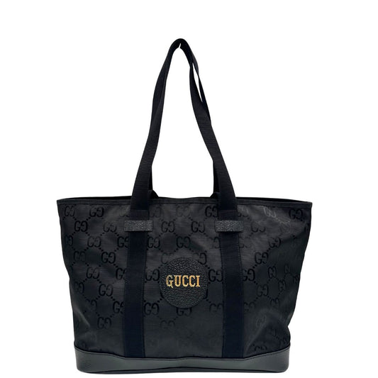 front Borsa Gucci in nylon GG nero con finiture in pelle tono su tono e parti metalliche argentate; munita di doppi manici in tessuto, indossabile a spalla, di lusso, originale, ottime condizioni8, usata 