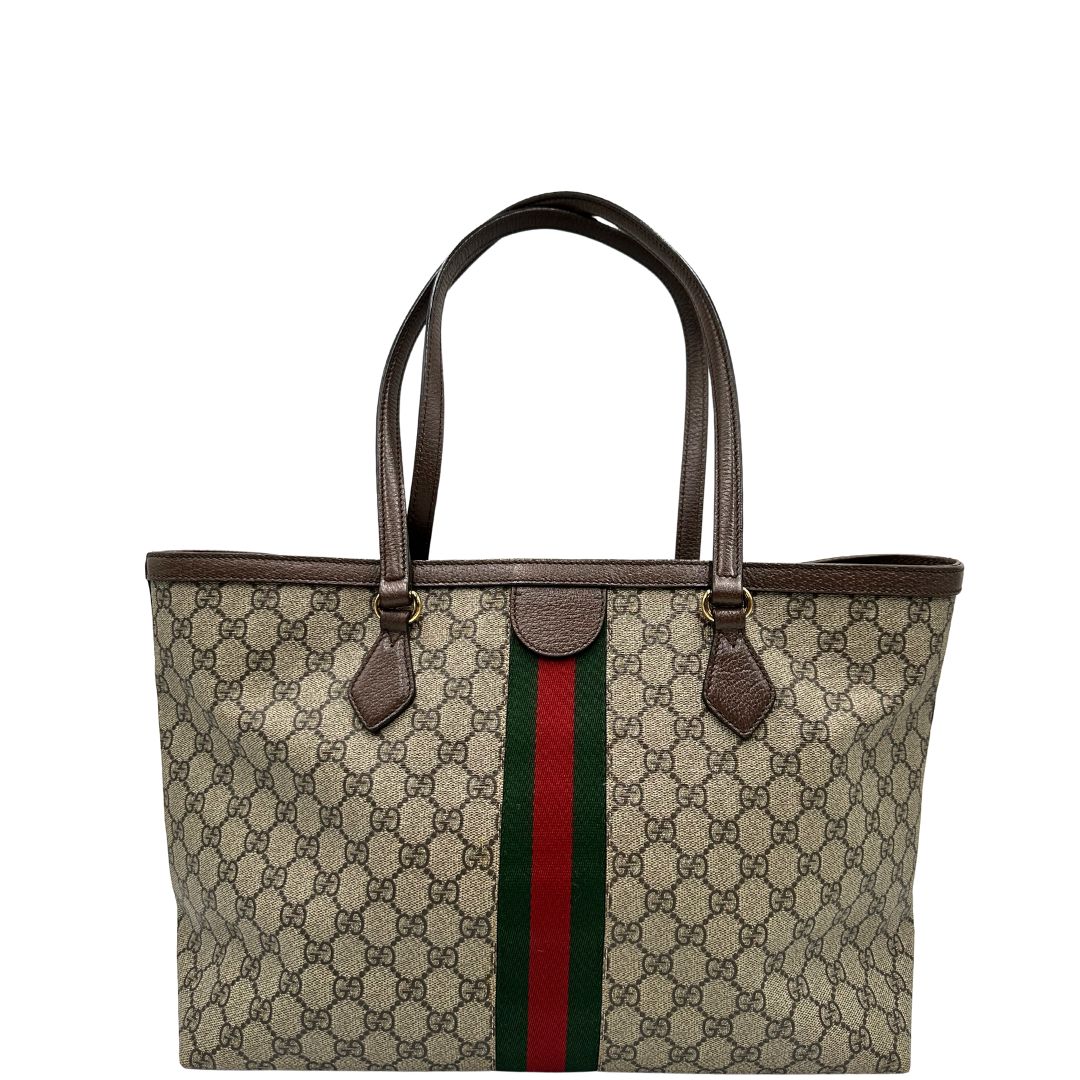 retro Shopper Gucci Ophidia in canvas beige GG con finiture in pelle marrone e striscia Web verde e rossa, da indossare a spalla. Doppie G decorative sul front in metallo dorato. Completa di corredo, di lusso, originale, ottime condizioni, usata. 