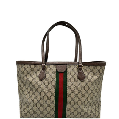 retro Shopper Gucci Ophidia in canvas beige GG con finiture in pelle marrone e striscia Web verde e rossa, da indossare a spalla. Doppie G decorative sul front in metallo dorato. Completa di corredo, di lusso, originale, ottime condizioni, usata. 