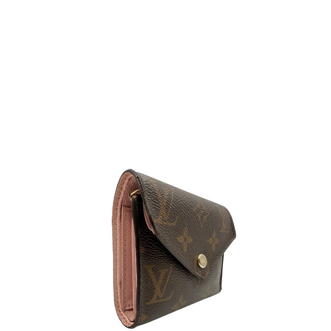 Portafoglio Louis Vuitton in canvas marrone monogram con parti metalliche dorate. Completo di scatola, di lusso, originale, ottime condizioni.