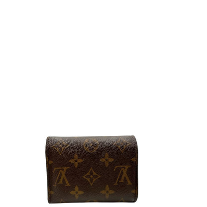 Portafoglio Louis Vuitton in canvas marrone monogram con parti metalliche dorate. Completo di scatola, di lusso, originale, ottime condizioni.