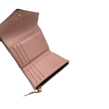 Portafoglio Louis Vuitton in canvas marrone monogram con parti metalliche dorate. Completo di scatola, di lusso, originale, ottime condizioni.