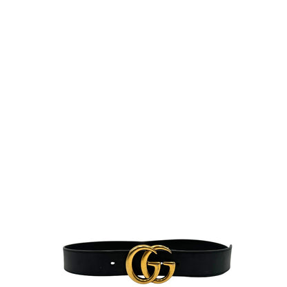 Cintura Gucci in pelle nera con parti metalliche dorate. Completa di dustbag, di lusso, originale, buone condizioni, usata