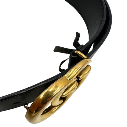 Cintura Gucci in pelle nera con parti metalliche dorate. Completa di dustbag, di lusso, originale, buone condizioni, usata