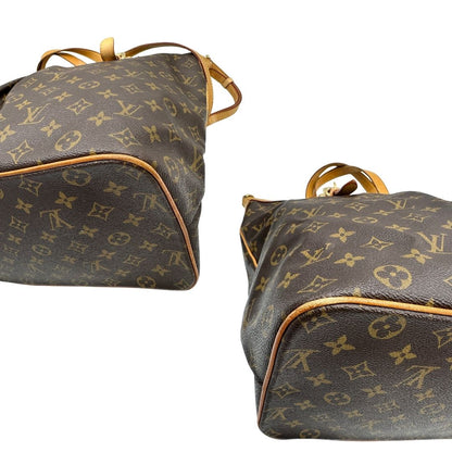 angoli Borsa Palermo GM Louis Vuitton in canvas marrone monogram con finiture in vacchetta naturale e parti metalliche dorate; munita di doppi manici, indossabile a spalla. Completa di dustbag, di lusso, originale, ottime condizioni, usata. 