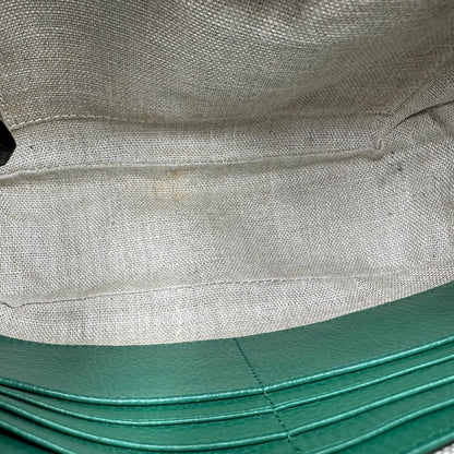 interno  Borsa Gucci in tessuto GG beige con finiture in pelle verdi e parti metalliche dorate; munita di una tracolla regolabile. Full set, di lusso, originale, ottime condizioni. 