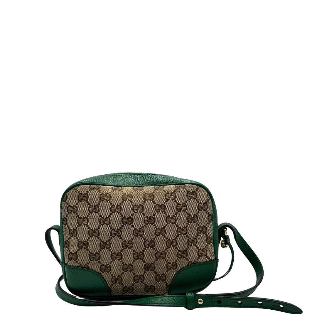 retro  Borsa Gucci in tessuto GG beige con finiture in pelle verdi e parti metalliche dorate; munita di una tracolla regolabile. Full set, di lusso, originale, ottime condizioni. 