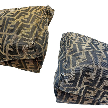 angoli Borsa Fendi in tessuto color tabacco trama Zucca; munita di doppi manici in pelle marrone, da portare a mano, di lusso, originale, ottime condizioni. 