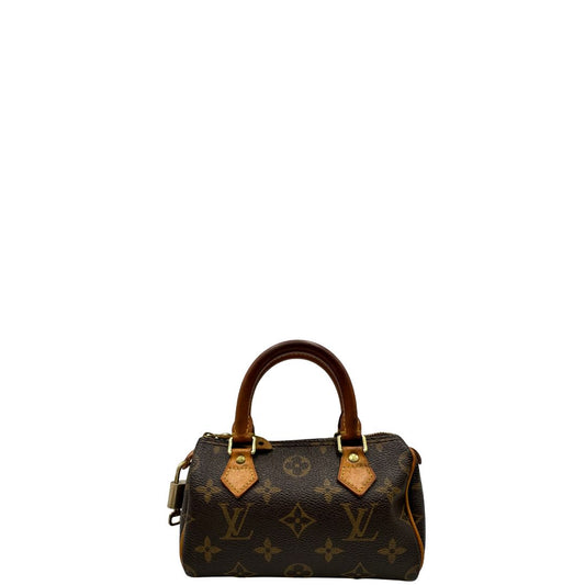 front Borsa Louis Vuitton in canvas marrone monogram con parti metalliche dorate e finiture in vacchetta naturale; munita di doppi manici stondati, da portare a mano. Completa di scatola, chiavi e lucchetto, di lusso, originale, ottime condizioni. 