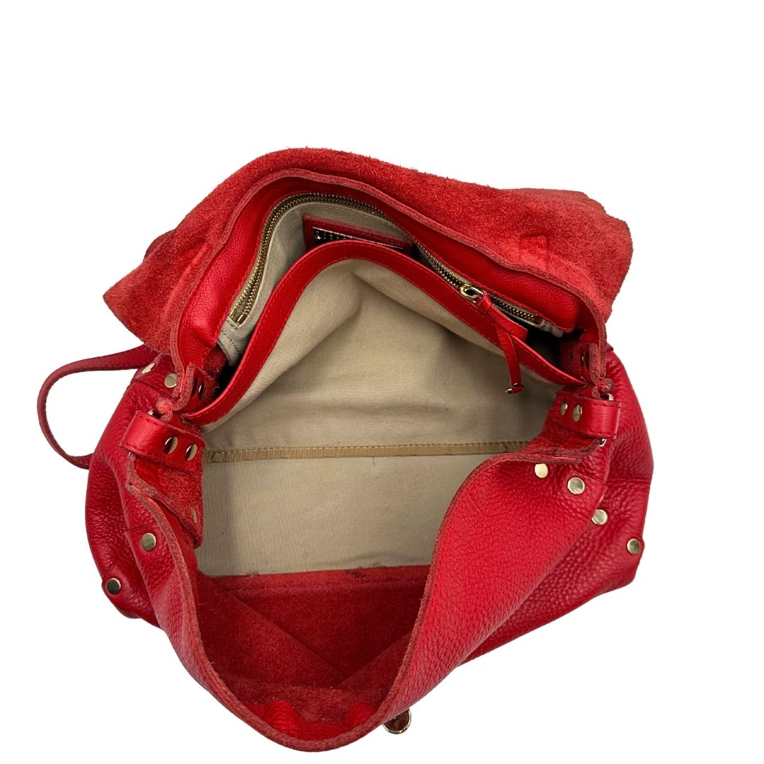 interno Borsa Zanellato in pelle martellata rossa con parti metalliche dorate; munita di un manico singolo e una tracolla amovibile e regolabile. Completa di dustbag, di lusso, originale, ottime condizioni, usata. 