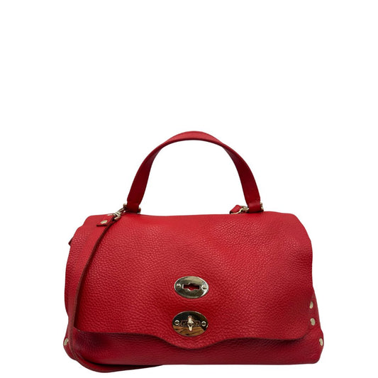front Borsa Zanellato in pelle martellata rossa con parti metalliche dorate; munita di un manico singolo e una tracolla amovibile e regolabile. Completa di dustbag, di lusso, originale, ottime condizioni, usata. 