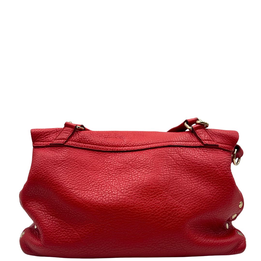 retro Borsa Zanellato in pelle martellata rossa con parti metalliche dorate; munita di un manico singolo e una tracolla amovibile e regolabile. Completa di dustbag, di lusso, originale, ottime condizioni, usata. 