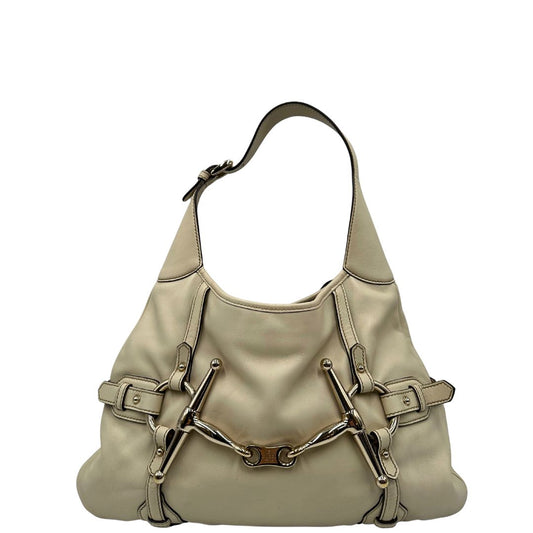 front Borsa Gucci in pelle color bianco avorio con parti metalliche oro chiaro; munita di un manico singolo, indossabile a spalla. Completa di dustbag, di lusso, originale, ottime condizioni, usata. 