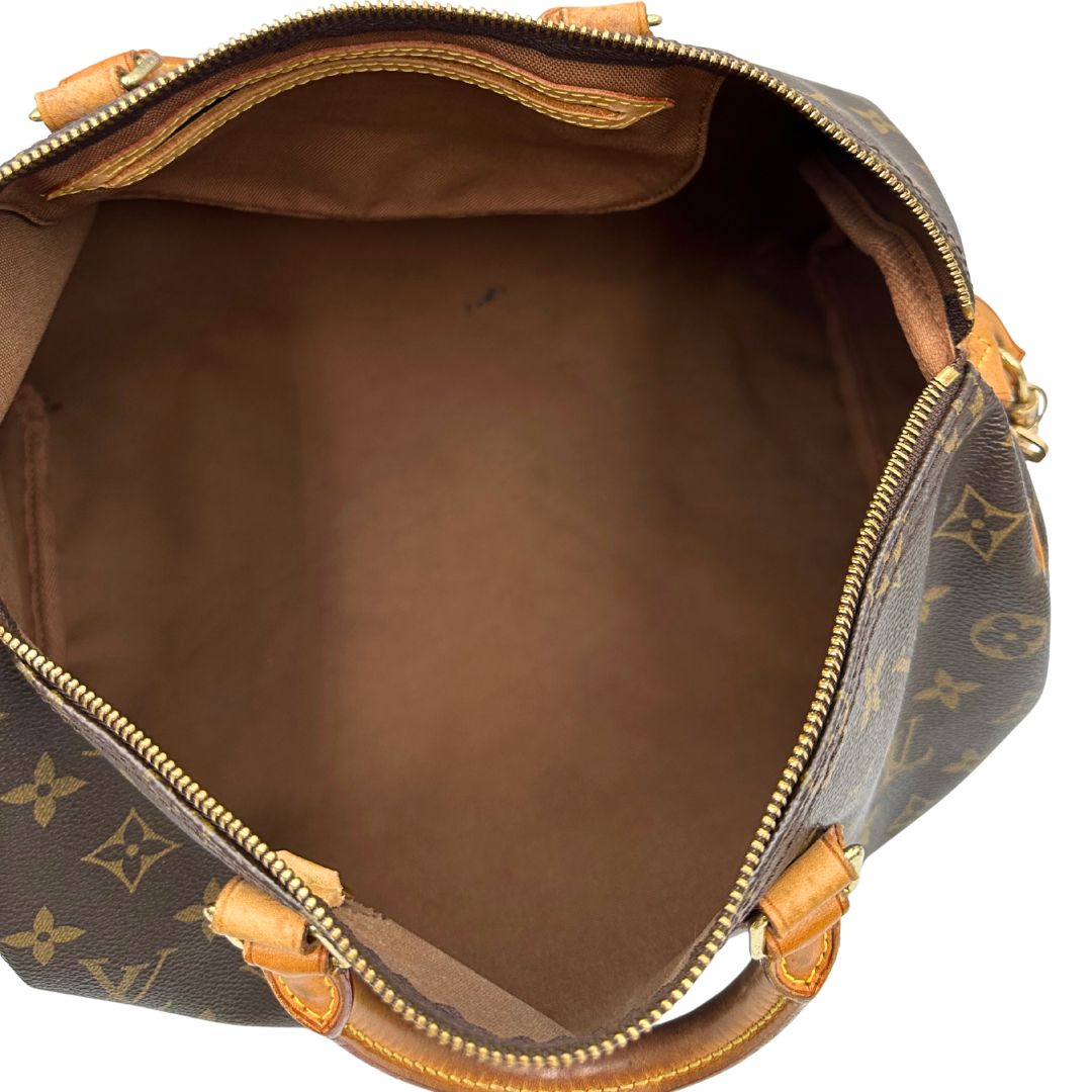 interno Borsa Louis Vuitton in canvas monogram marrone con parti metalliche dorate; munita di doppi manici stondati, da portare a mano. Completa di dustbag, lucchetto e chiavi, di lusso, usato, ottime condizioni. 
